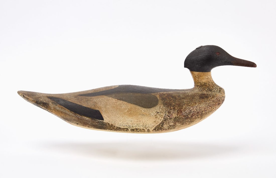 George Huey Merganser Decoy: George R. Huey (American, 1866–1947) merganser decoy. Signed on bottom. Carved wood with original paint.. Friendship, Maine, early 20th century. Provenance: Russ Goldberger. H 6-1/2 in. L 18 in.