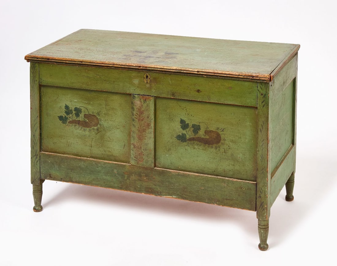 Paint-Decorated Blanket Chest: Blanket chest in original apple green paint with original decoration. Lid with leaf/floral motifs. The front of the chest has ascending vines on each side, and vegetable decoration. Pine. Interior of 