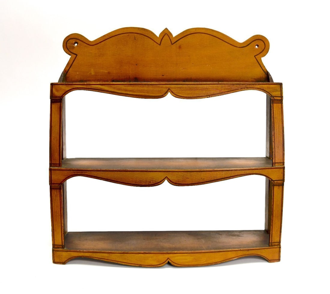 Paint Decorated Hanging Shelf: Paint Decorated Hanging Shelf. Yellow painted base with thin brick red border decoration. American, circa 1830. H 22 in. W 21 in. D 5-1/8 in. 