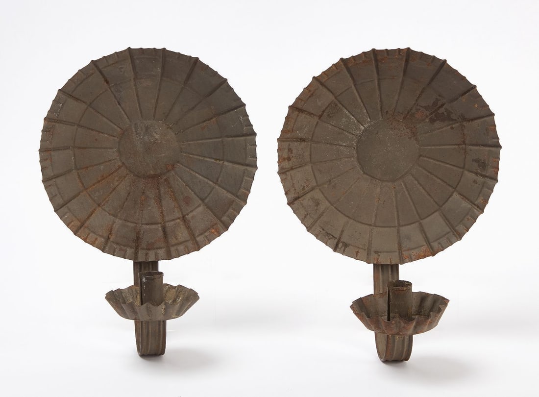 Pair of Tin Sconces: Pair of tin candle sconces. New England, circa 1820. D 9 in.