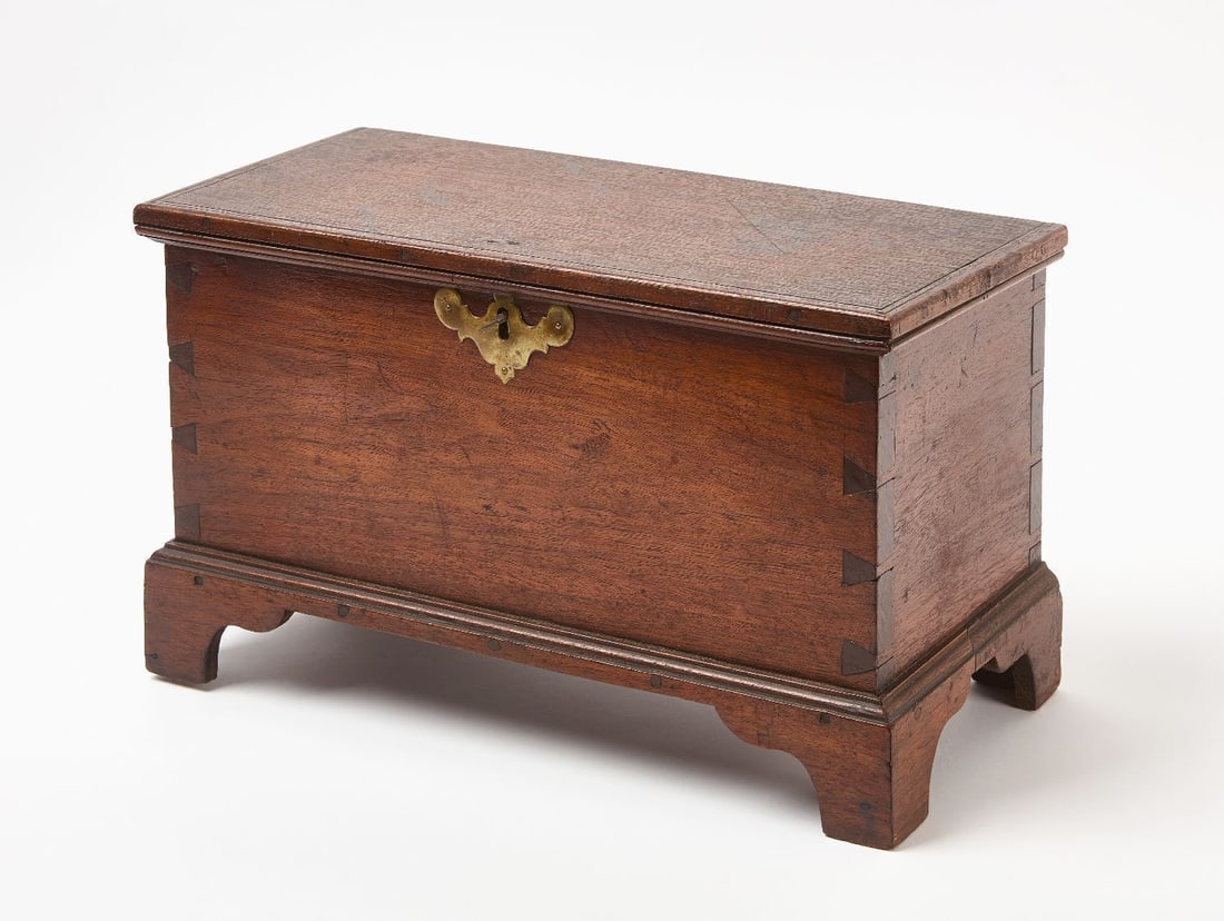 Miniature Blanket Chest: Miniature blanket chest. Dovetail and forged nail construction. American, 19th century. Key included. H 10-1/4 in. W 16 in. D 8 in. 