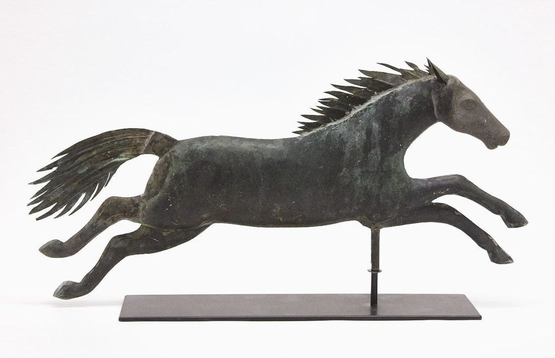 A. L. Jewell Flying Horse Weathervane: Flying horse weathervane attributed to A. L. Jewell. Molded hollow-body copper with cast zinc head. Massachusetts, circa 1852-1867. Stand included as shown. Horse only: H 13 in. L 29 in. On stand