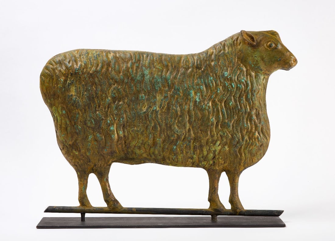 Ewe Weathervane: Ewe weathervane. Attributed to Cushing and White. Moded copper with worn historic yellow and gold paint and verdigris. Waltham, Massachusetts, circa 1870. H 18-1/.2 in. L 24 in D 2-1/2 in.