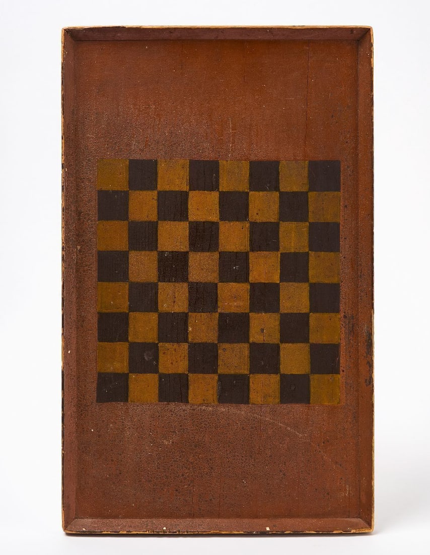 Checkerboard in Yellow and Black Paint: Checkerboard with Yellow and Black Squares on Salmon Ground. Original paint on framed wood panel. New England, 19th century. 20-3/4 in. x 12-3/4 in.