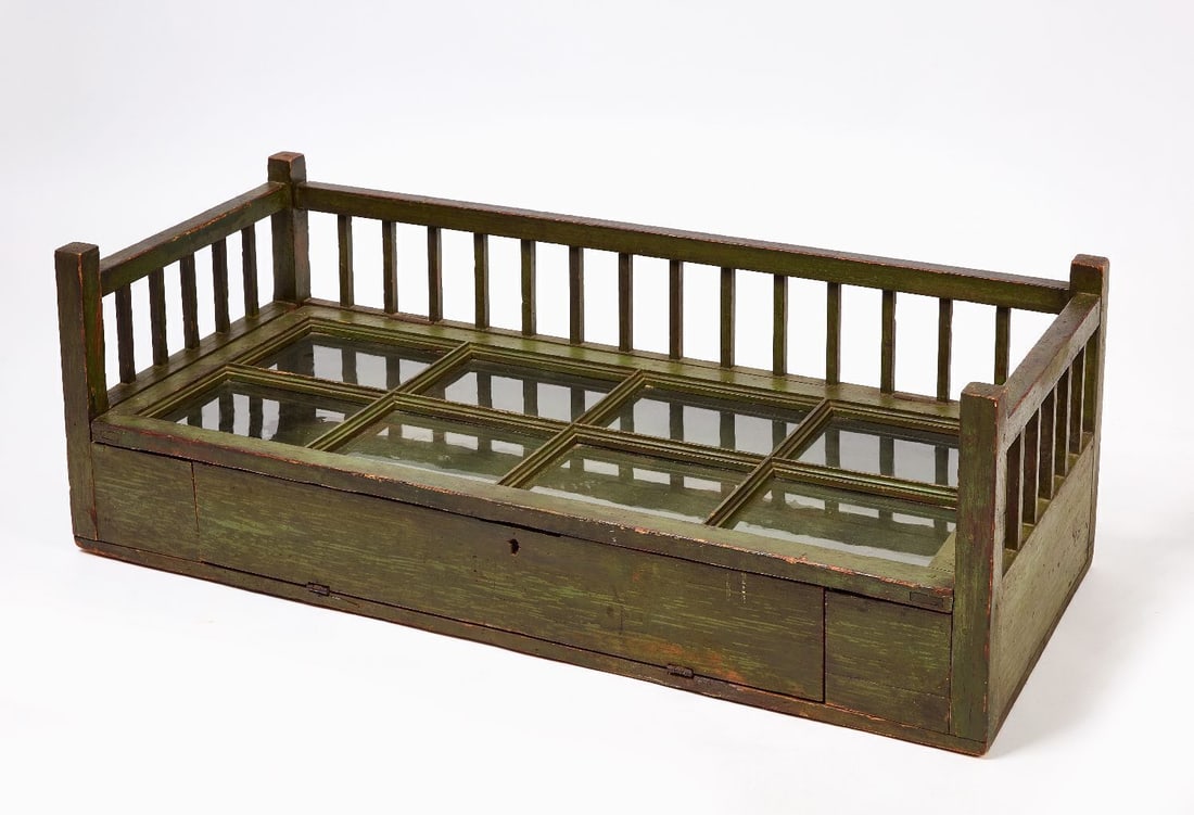 Country Countertop Case in Green Paint: Country Countertop Case. Original sage green paint with early glass. Glass leaded in place. Northeastern United States, early 19th century. H 14-1/2 in. W 42-1/2 in. D 18-1/4 in. 