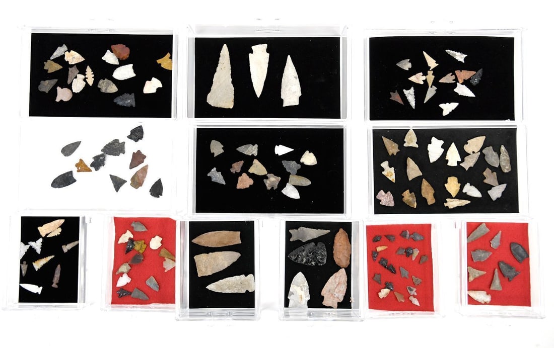 Group B - Collection of Native American Lithics: Collection of Native American Lithics housed in storage containers (included). Largest (box): H 6-1/2 in. W 9-1/4 in. D 5-3/8 in. Largest lithic: H 1-1/8 in. W 4-1/2 in. D 1-1/8 in. Smallest