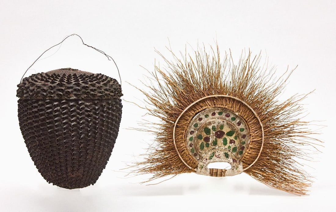 Acorn Basket and Paper Mache Fan: Basket acorn-shaped woven with a lid and Indian paper mache decorateve fan with natural fiber radiating elements.early to mid 20th century. Basket: H 11 in. D 10 in. Fan: H 13 in. W 18 in.