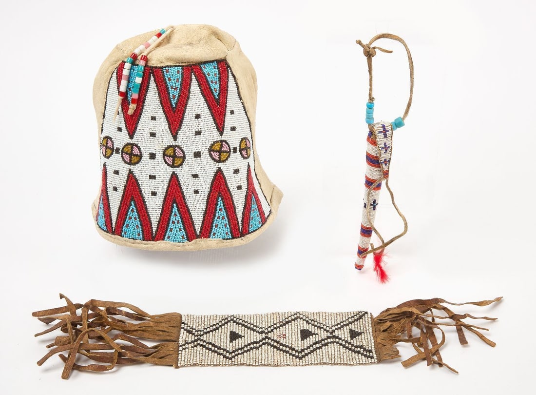 Native American Beaded Cap, Awl Case, and Pouch: Native American group of beaded cap,awl case, and pouch. Late 19th - Early 20th century. Cap. H 8-1/2 in. W 12 in. Whip: L 6-1/2 in. Pouch: L 16 in. W 3-1/4 in.