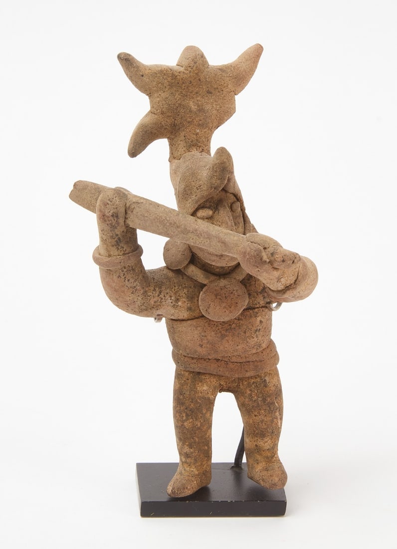 Pre-Columbian Clay Figure: Pre-Columbian Clay Figure. Lot includes stand. H 6-7/8 in. W 3-3/4 in.