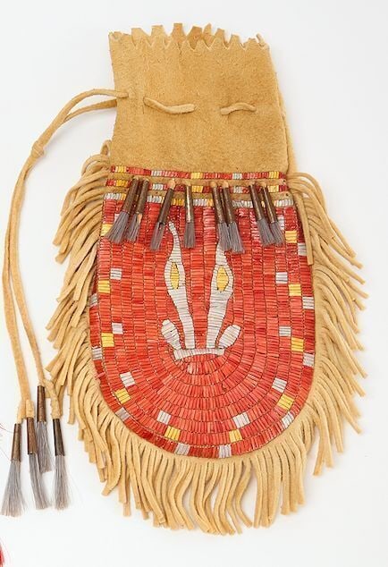 Native American Quillwork Bag: Native American bag. Quill work and tin cones on hide. L 11 in. 