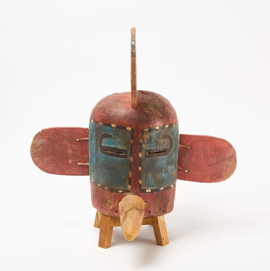 Hopi Kachina Mask: Native American Hopi kachina mask carved from cottonwood and painted with natural pigments. 20th century. H 19 in. 