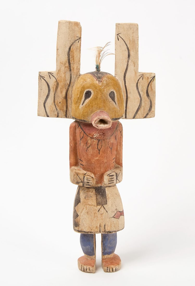 Hopi Kachina Doll: Carved wooden Hopi kachina doll with painted details and headdress. mid-20th century. H 15-1/2 in.