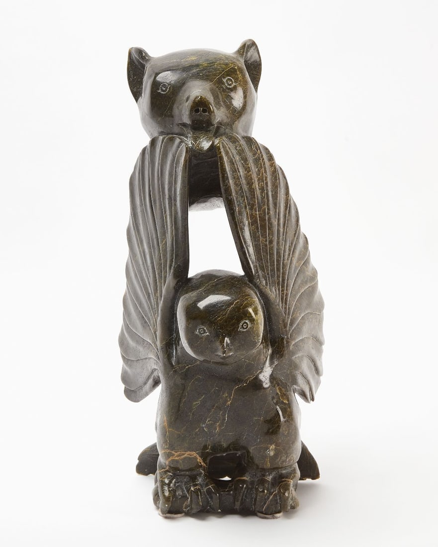 Pudlo Melia Owl with Bear Head: Pudlo Melia ( 1916–1992) Carving of an owl with bear head. Also spelled Melia Pudluq, 1940 Kinngait. Alternate spellings are common for Inuit names. H 19 in.