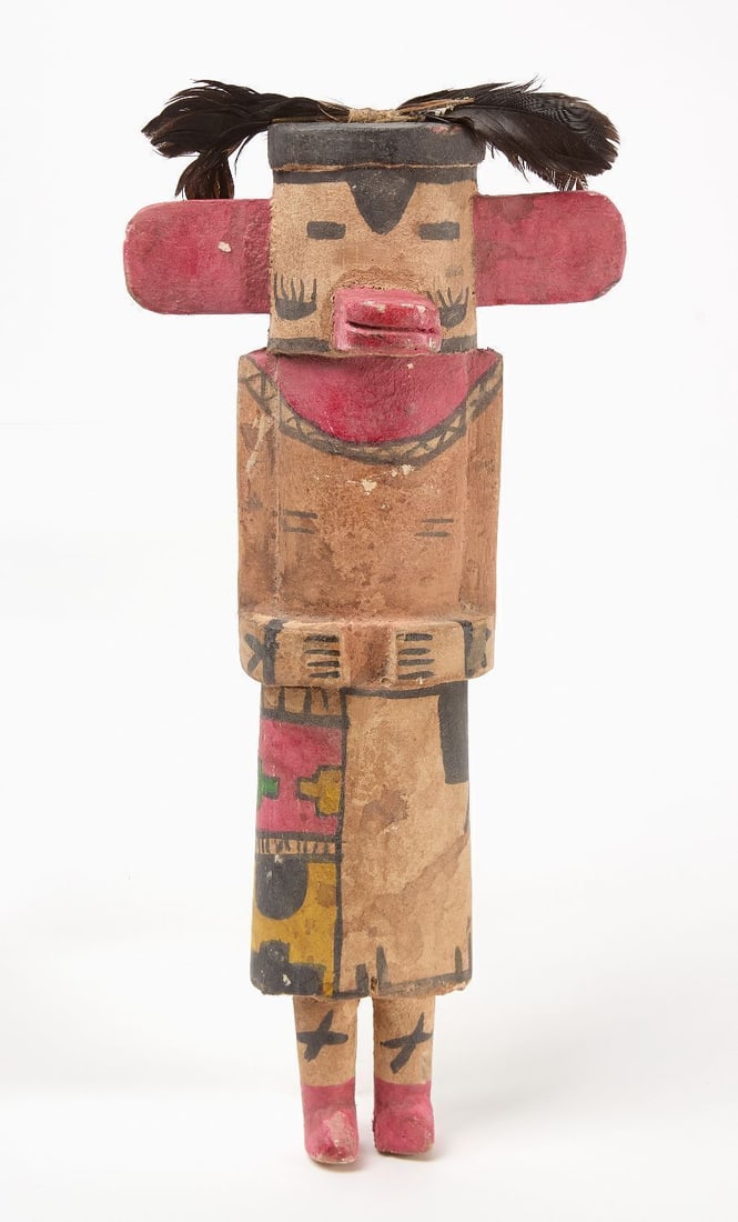 Kachina Doll: Carved and painted wooden kachina doll with feather adornments, 20th century. H 15-1/2 in.