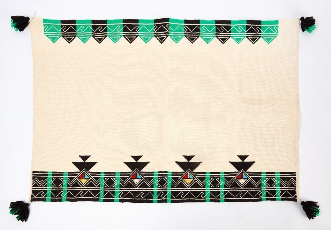 Hopi Child's Manta: Hopi child's manta. Woven cotton with wool embroidery. Southwestern US, circa 1950. L 24-1/2 in. W 36 in.