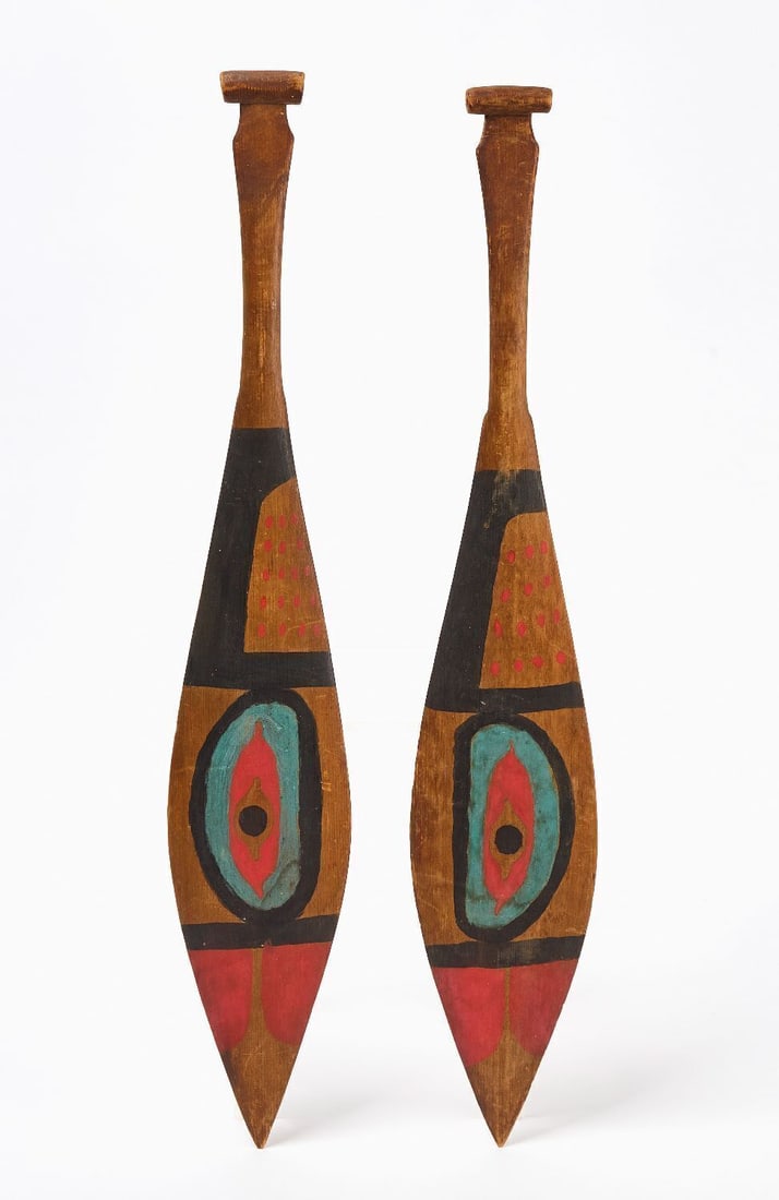 Pair of Northwest Coast Miniature Paddles: Pair of Northwest Coast Miniature Paddles. Original paint on cedar. Pacific Northwest region, circa 1920. L 23 in. W 4 in.