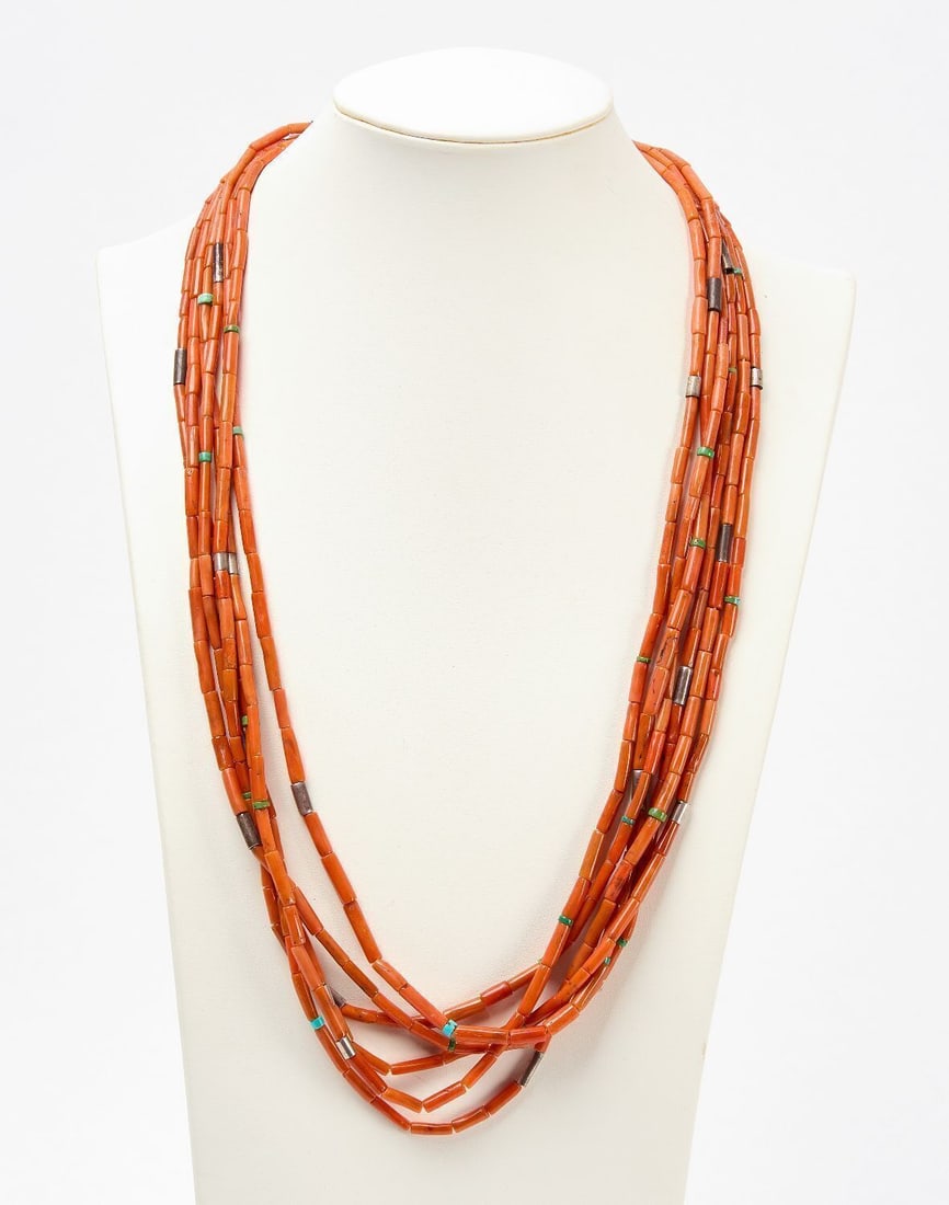 Navajo Red Coral Multi-Strand Necklace: Navajo red coral multi-strand necklace comprised of 6 strands on each side. Silver end caps. Southwestern US, mid 20th century. (Clasped): L 14-3/8 in.