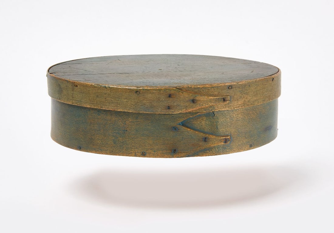 Shaker Box in Blue Paint: Shaker 3-finger storage box in old blue paint. New England, mid to late 19th century. H 2-1/4 in. W 8-1/8 in. D 5-1/2 in.