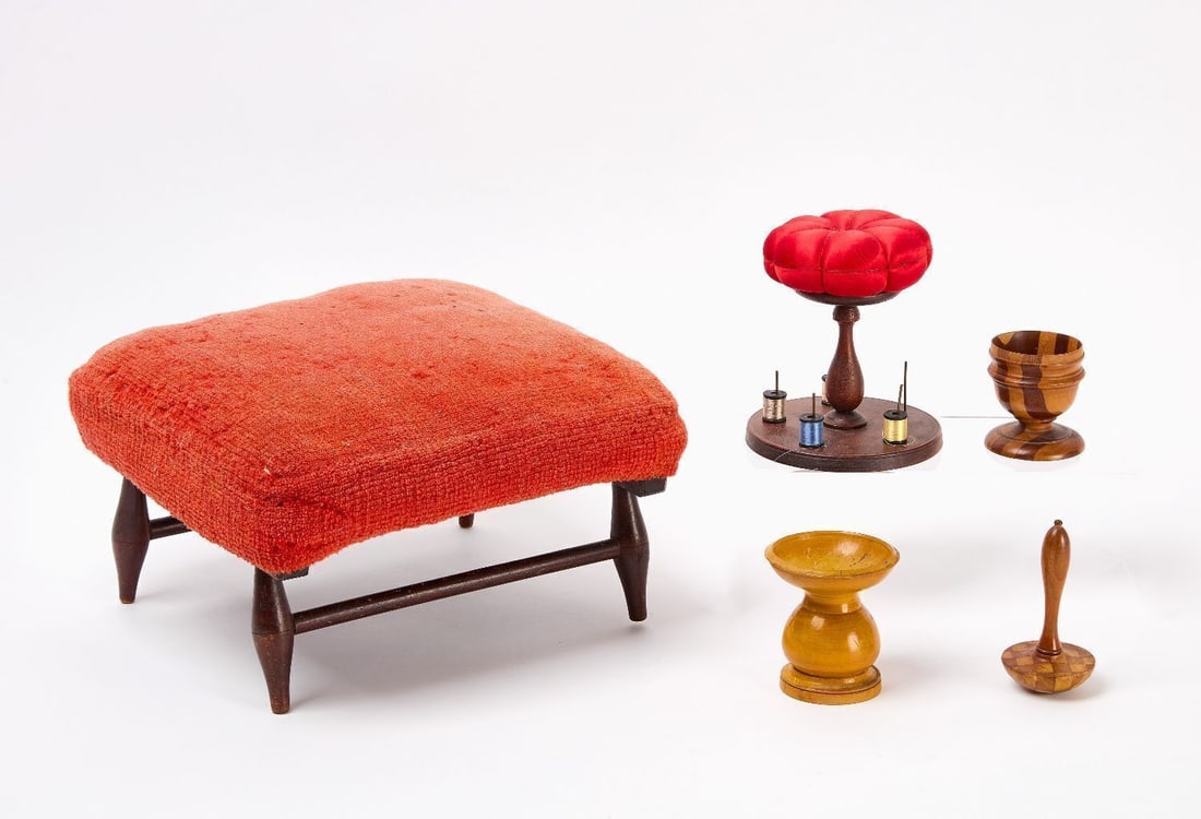 Group of Shaker Items: Shaker group including a Mt. Lebanon footstool, sewing stand with red pin cushion top and four spools of thread, marquetry darning tool, egg cup, and a pounce pot. New England, late 19th century.