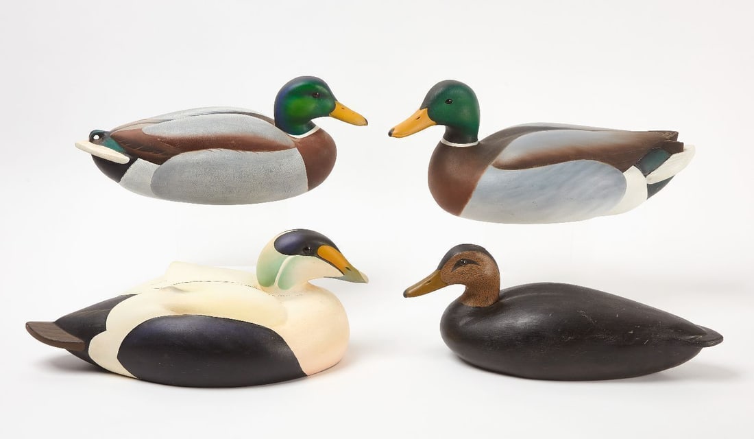 Four Duck Decoys: Four Vintage carved and painted wooden duck decoys by Mueller and Pleines. H 8 in. L 18 in. H 7-1/2 in. L 18 in. H 6-1/2 in. L 17 in. H 7 in. L 17 in.
