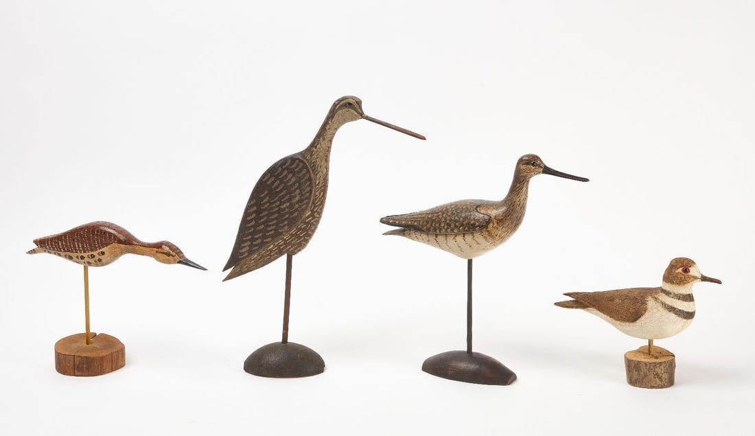 Four Shorebird Decoys: Four hand carved and painted wooden shorebird decoys. Signed on the bottom of base. 20th century. H 7-1/2 in. L 10 in. H 8-1/2 in. L 12 in. H 12 -1/2 in. L 13 in. H 15-1/4 in. L 13 in.