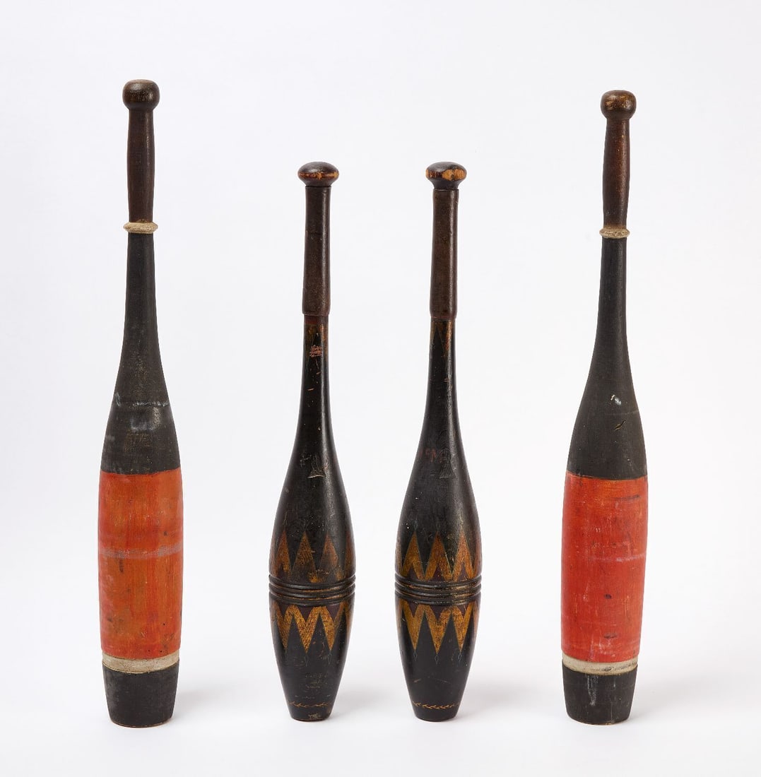 Two Pairs of Painted Exercise Pins: Two pairs of juggling pins. Turned wood with original paint. American, circa 1900. H 25-1/4 in and 22-1/4 in.