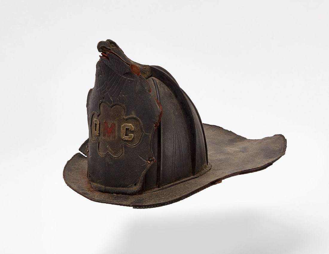 Early Leather Fire Hat: Early tooled leather fire hat, Stamped by maker. Bowery, NY. H 9 in. D 16 in. W 11 in.