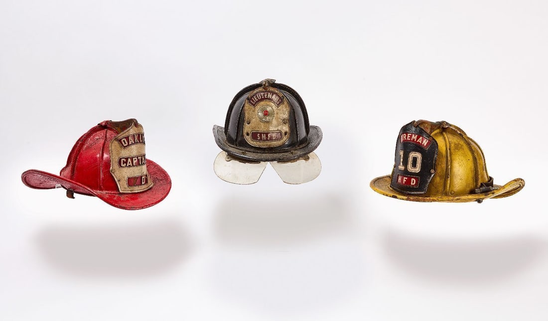 Three Cairns Fire Hats: Three Cairns fire hats. Each with Cairns tag. Each approx: H 8 in D 13 in W 10 in 