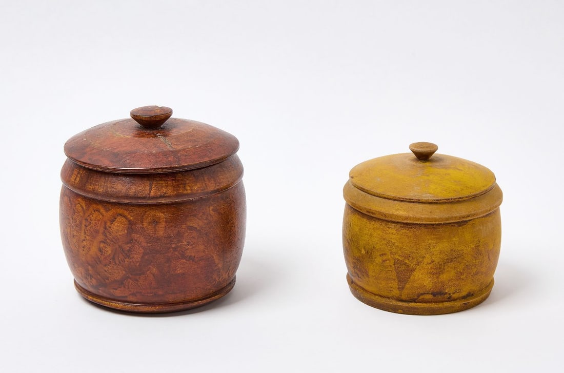 Two Pennsylvania Painted Covered Sugar Bowls: Two Pennsylvania painted covered sugar bowls. One with original sponge decoration the second with original dry yellow paint-decoration. Pennsylvania, mid 19th century. H 6 in. D 6 in. H 4-3/4 in. D