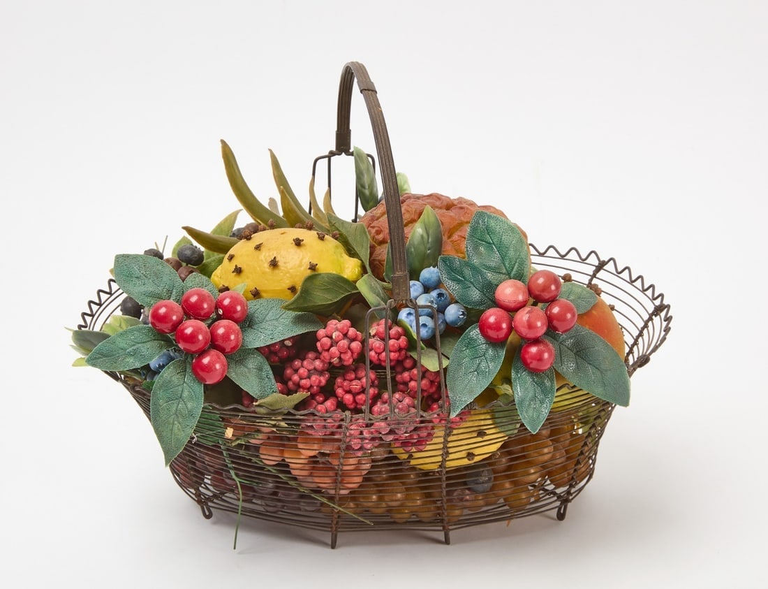 Wire Basket with Fruits: Wire basket filled with fruits and foliage. H 11 in. W 14 in. D 10 in. 