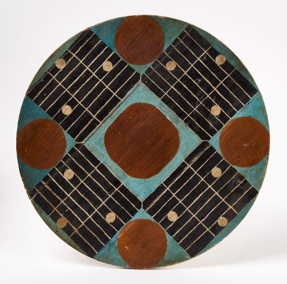 Circular Parcheesi Gameboard: Round parcheesi game board. Original paint on wood panel. American, circa 1900. D 16-1/2 in. Collection of Bruce and Doranna Wendel.