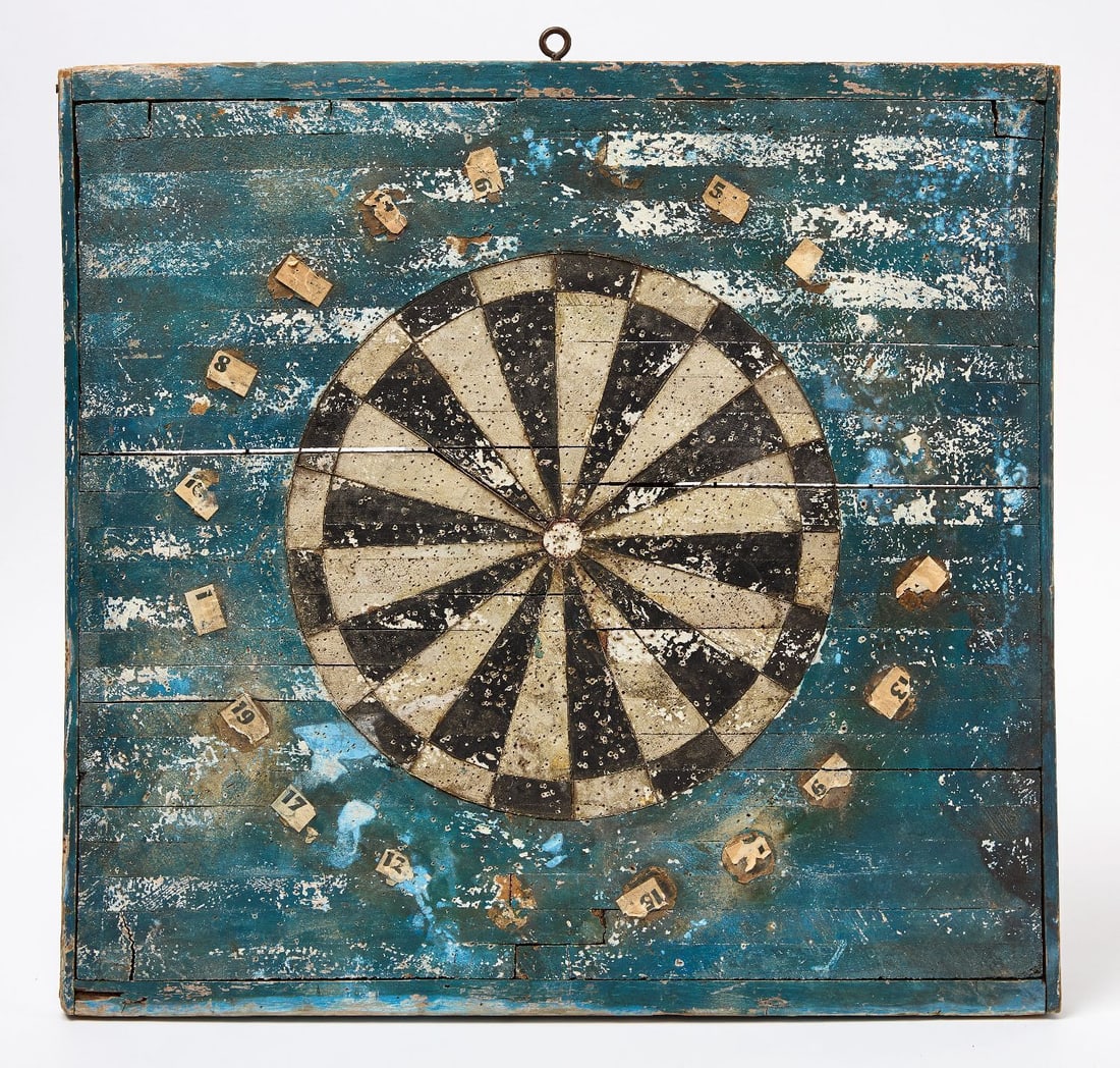 Dartboard Game: Dartboard game with distressed blue painted surface. Original paint on wood panel. American, mid-20th Century. H 20-1/2 in. W 21-1/2 in. Collection of Bruce and Doranna Wendel.