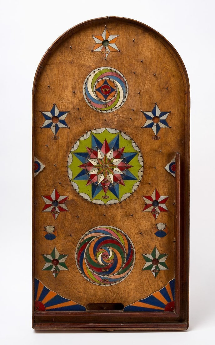 Pinball Gameboard: Pinball gameboard with stars. Original paint on framed wood panel. American, late 19th century. H 30-1/2 in. W 15-1/2 in. Collection of Bruce and Doranna Wendel.