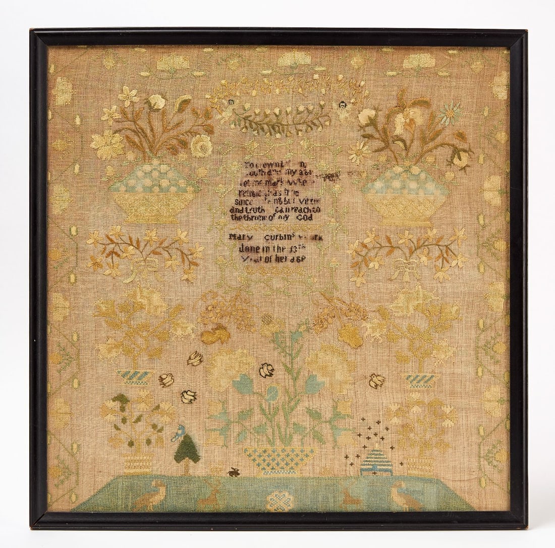 Needlework Sampler - Mary Carbin, 1827: Needlework sampler wrought by Mary Carbin in her 15th year of age, approximately 1827. Mary lived from 1812-1875. Depicts large baskets of flowers, birds, bees, and other wildlife. Later frame. 