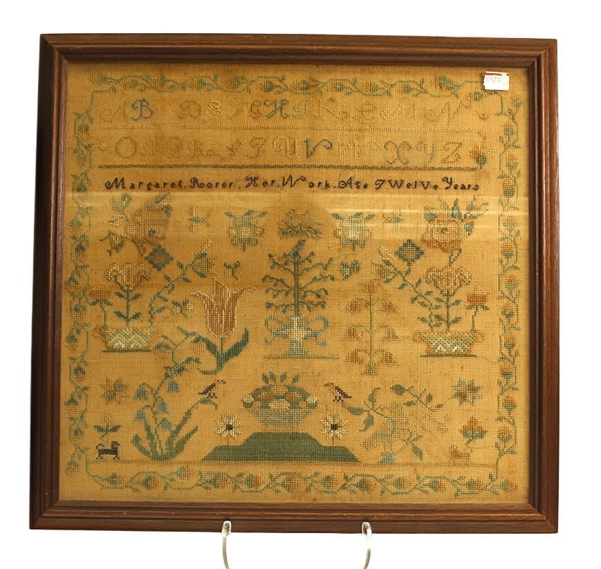 Needlework Sampler - Margaret Rorer: Needlework sampler wrought by Margaret Rorer. Needlepoint on linen. Depicts a majority of floral motifs with a floral border. American, early 19th century. Frame: H 18-3/8 in. W 19-3/8 in. Sight: H 16