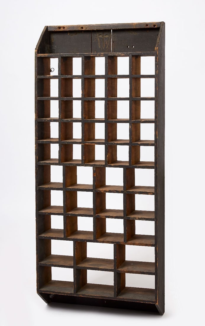 Painted Display Wall Shelf: Display wall shelf in old black paint. Total of 43 compartments. American, 19th century. H 47 in. W 20-1/4 in. D 5-7/8 in.