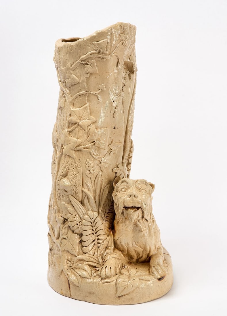 F. B. Norton Stump Umbrella Stand with Terrier: Rare F. B. Norton stump umbrella stand with recumbent dog (Terrier). Salt-glazed molded stoneware with stamp. Worcester, MA, circa 1886. Background: According to Kevin Daughney, company historian for