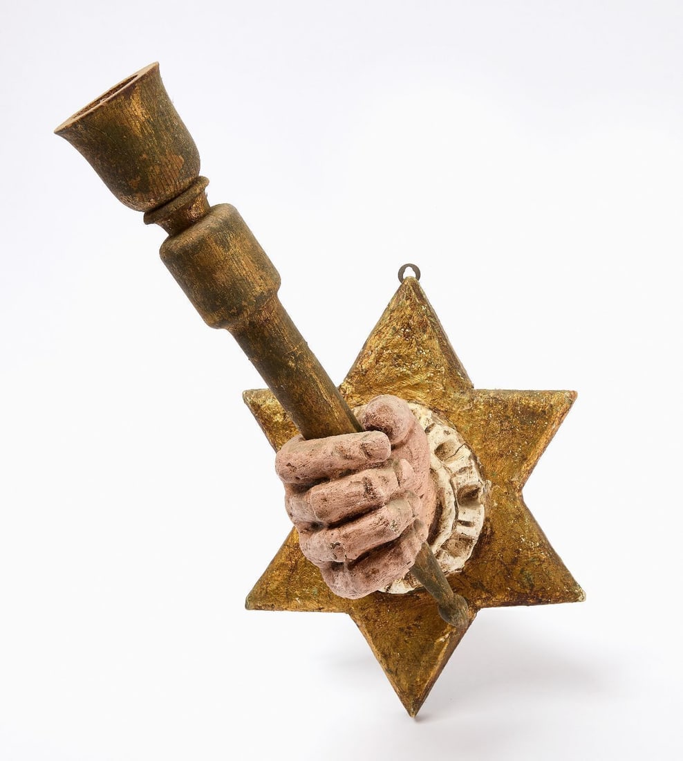 Hand Wall Sconce:  Wall sconce in the form of a hand holding a torch with a star backplate. American, first half 20th century. H 15 in. W 8-1/2 in.