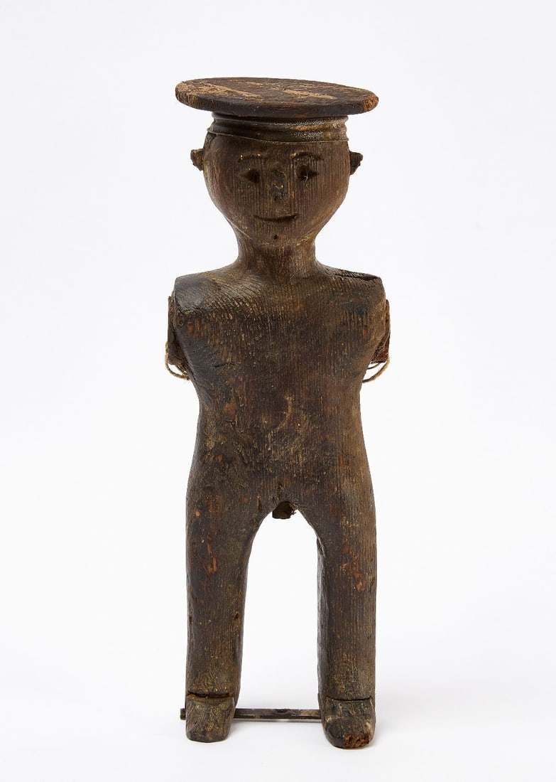 Whirligig Figure of a Sailor: Early whirligig figure of a sailor. Carved wood with remnants of old black paint. No arms. American, 19th century H 13-5/8 in. W 4-5/8 in. D 4-1/8 in.
