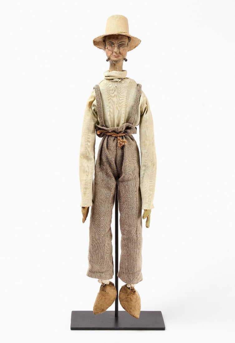 Folk Farmer Doll with Wood Sculpt Face: Folk Farmer Doll with wood sculpt head. Features a cloth body, period clothing and straw hat, hand-sculpted wood face with hand-painted facial features and applied facial hair. American, 19th