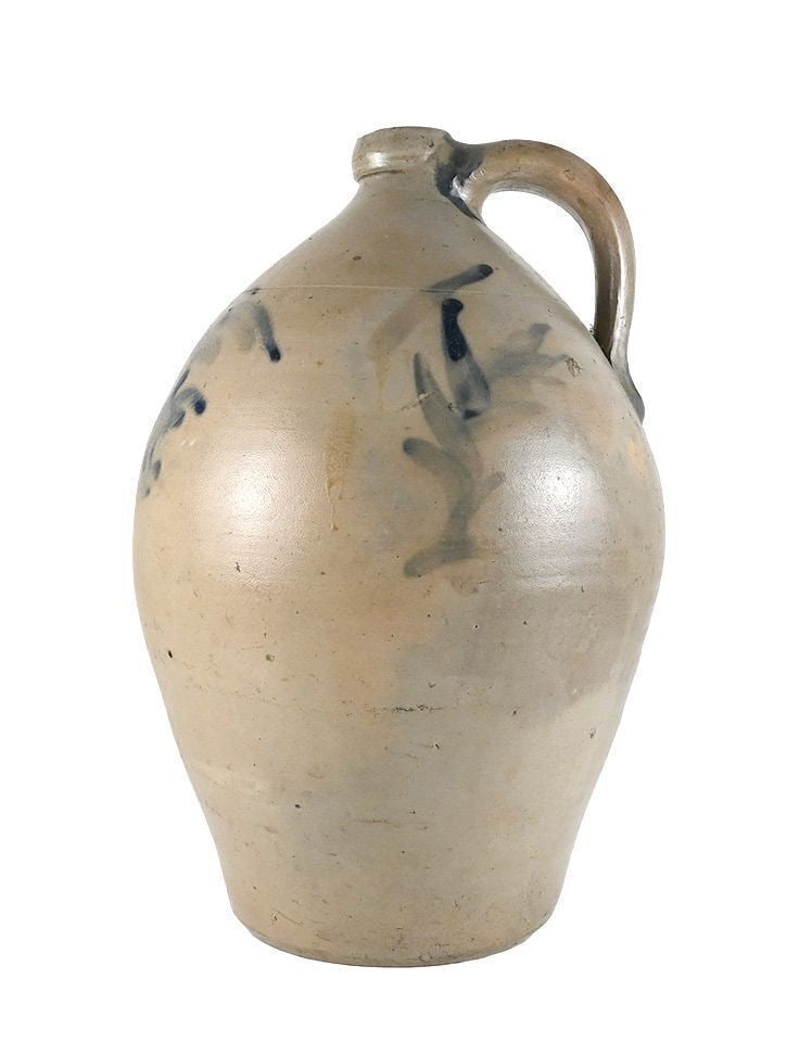Smith & Day Two-Gallon Stoneware Jug, Norwalk, Connecticut: Stoneware ovoid jug with cobalt blue floral decoration. Impressed oval maker's mark "Smith & Day, Manufacturers, Norwalk, Conn." with impressed capacity number "2."