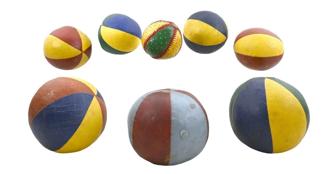 Group of Vintage Juggling Balls: Group of Juggling Balls. Painted oil cloth, panel construction. American, early 20th century. Largest: H 4-7/8 in. W 5-1/8 in. D 5-1/8 in. Smallest: H 3-1/2 in. W 3-1/8 in. D 3-1/8 in. 