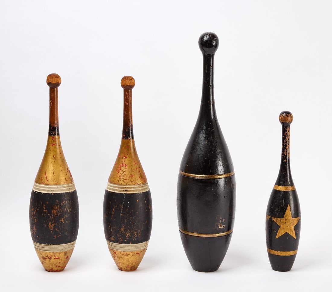 Group of Juggling Clubs: Group of four wooden juggling clubs with painted designs. circa Early 20th century. H 18 in. to 26-1/2 in.