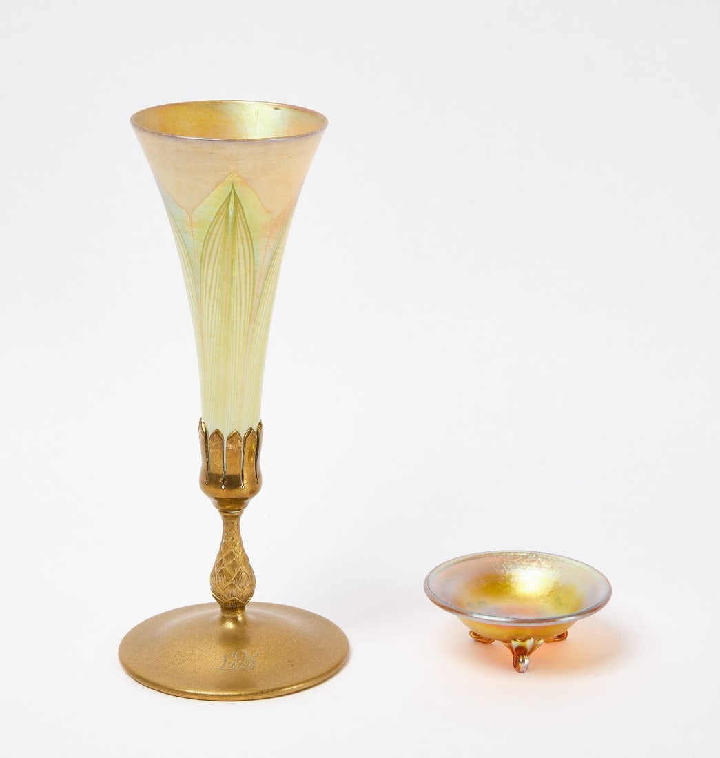 Tiffany Favrile Trumpet Vase: Tiffany Favrile Trumpet Vase with bronze base. Together with a small unsigned Tiffany candy dish. Etched MS 8. Vase: H 11-3/4 in Dish: H 1-1/2 in. D 4 in.