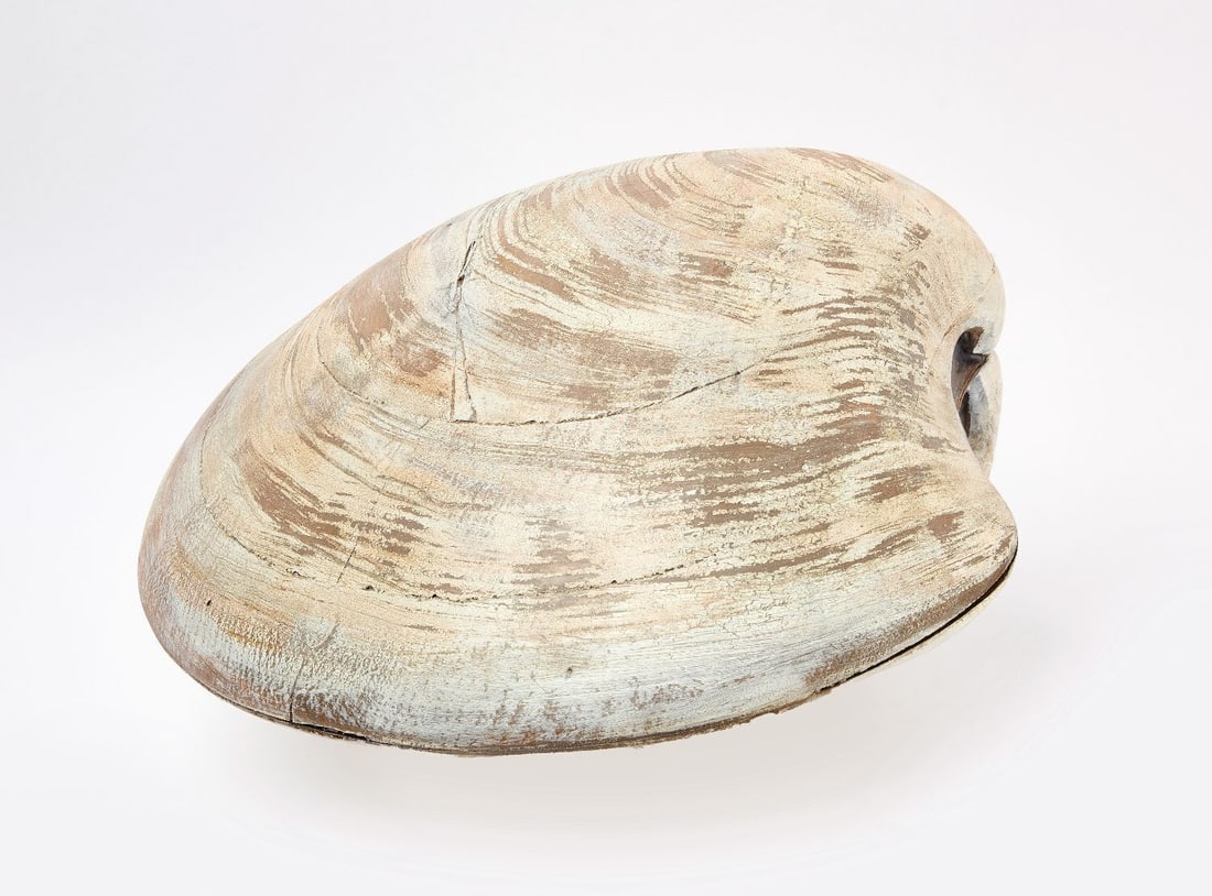 Rhode Island Folk Art Quahog Sculpture: Caleb Brown (Rhode Island), carved and painted wood 'Quahog' folk sculpture. Carved in the round and painted to replicate the shell's coloring and texture. H 9-1/2 in. W 23 in. D 19