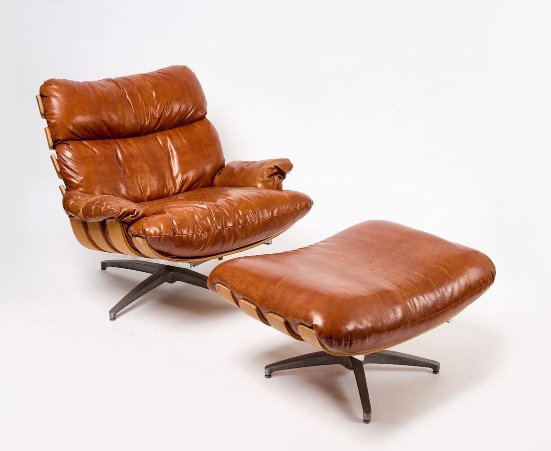 Mid Century Modern Lounge Chair and Ottoman: Mid century modern lounge chair with matching ottoman. Cognac colored leather upholstery over wood. circa 1960. H 35-1/2 in. W 36 in. D 35-1/2 in. H 17-1/2 in. W 30-1/2 in. D 24-3/4 in.