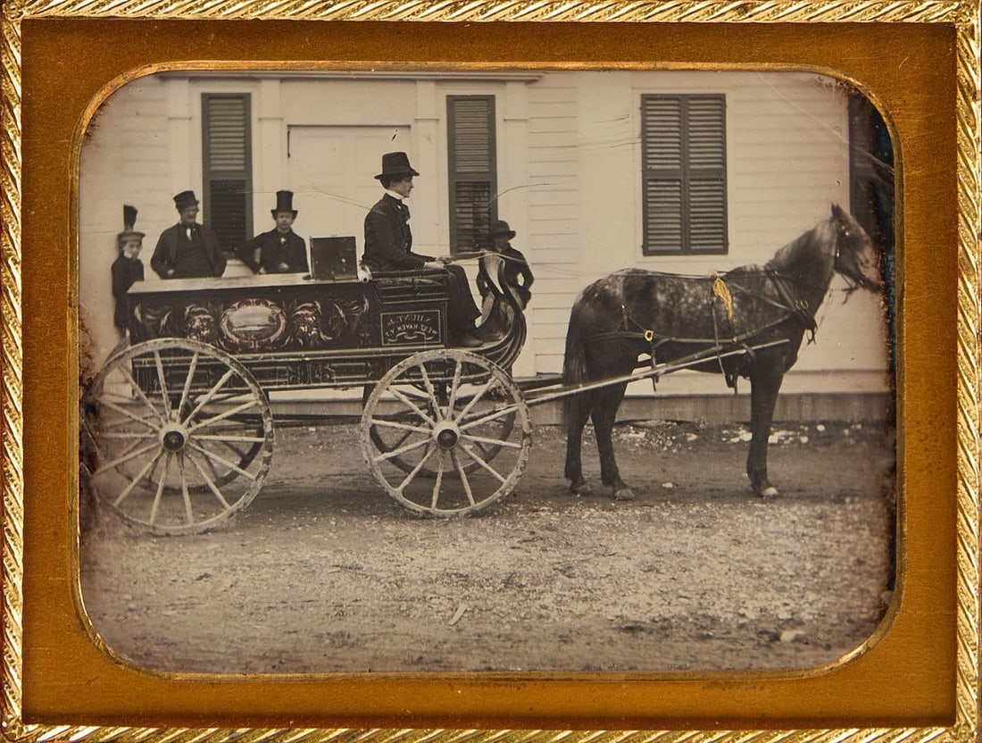Quarter Plate Occupational Daguerreotype with Wagon: Quarter plate occupational daguerreotype of a businessman shown driving a horse-drawn wagon with paint-decorated side panel. Side reads 'Seth Hunt Jr. -West Haven, VT.' Daguerreotype is in hor
