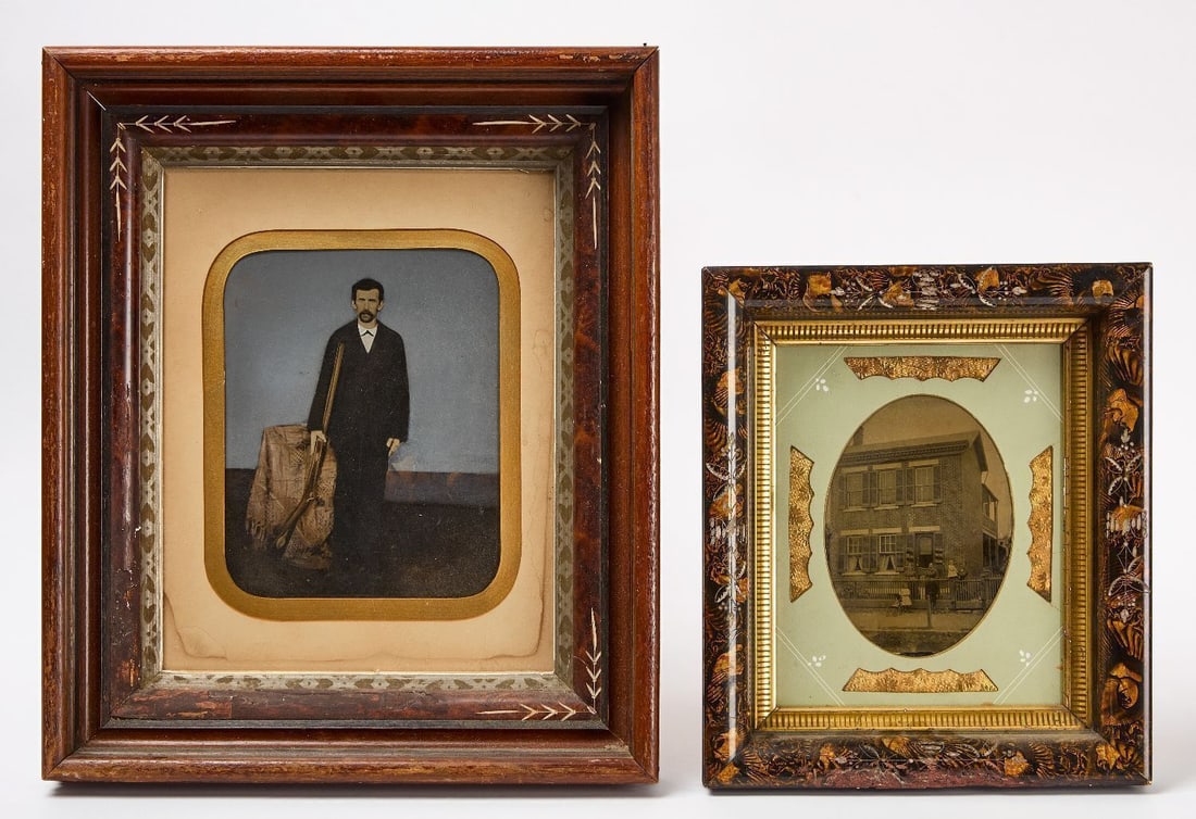 Two Large Framed Tintypes: Two large framed tintype photographs. One, a mammoth plate tintype hand-colored showing a standing man with a firearm. Period eastlake frame. Together with an exterior view of a home showing a small f