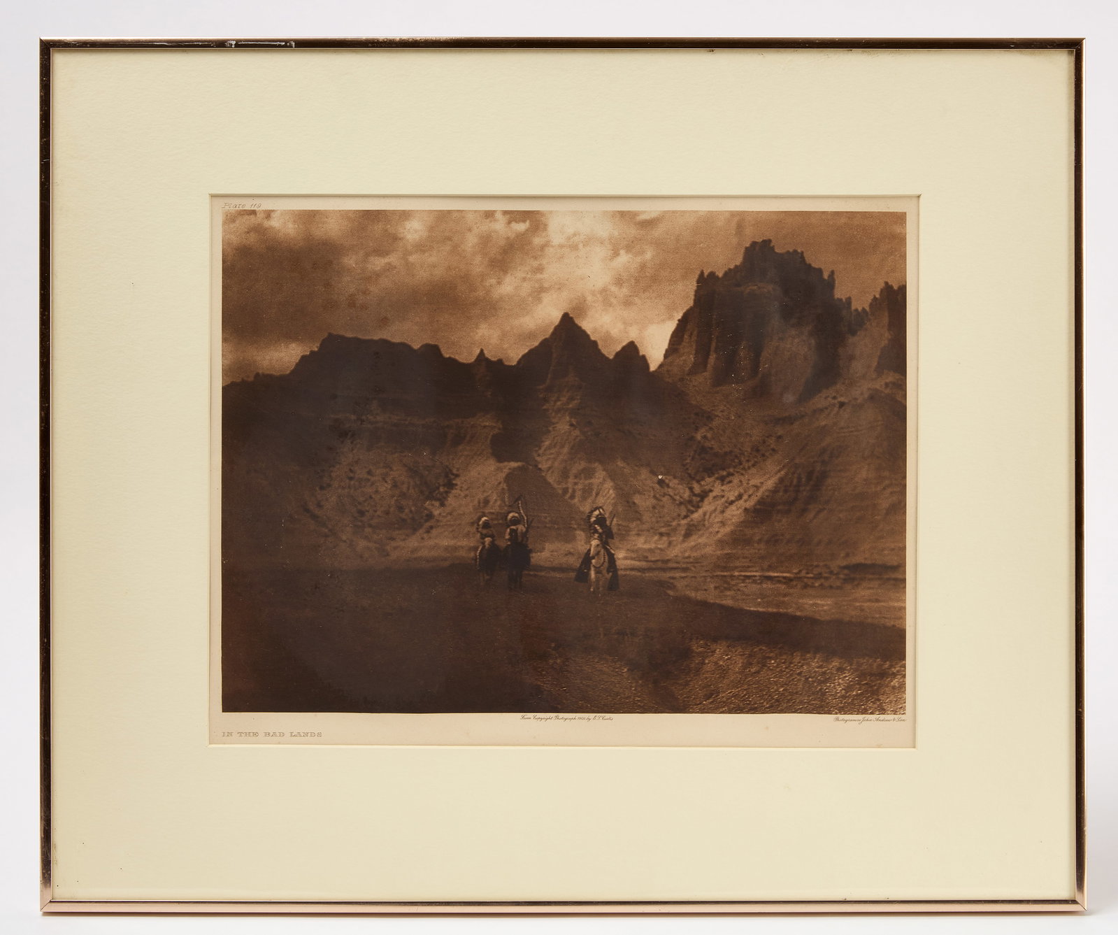 E. S. Curtis - In The Bad Lands: Edward Sheriff Curtis (American, 1868–1952). Engraved by John Andrew & Son (Boston, est. 1869). 'In the Bad Lands'. Photogravure on paper. Newer frame. American, circa 1880. Fr