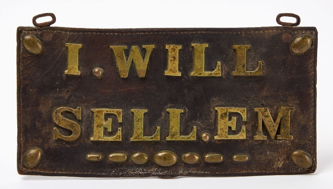 Early Salesman Sample Leather License Plate - 'I Will Sell Em': Early leather license plate with applied brass letters with the phrase 'I Will Sell Em'. Utilized as a salesman sample to sell automobiles. American, circa 1900-20. H 6-1/2 in. W 11-7/8 in.